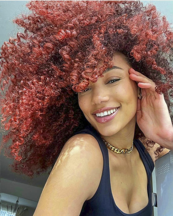 Red long curly hairstyles for black women