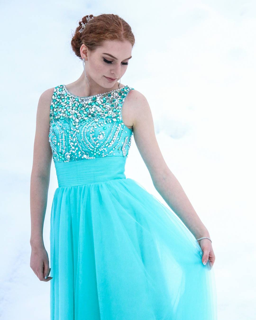 Turquoise bridesmaid dress adorned with stones