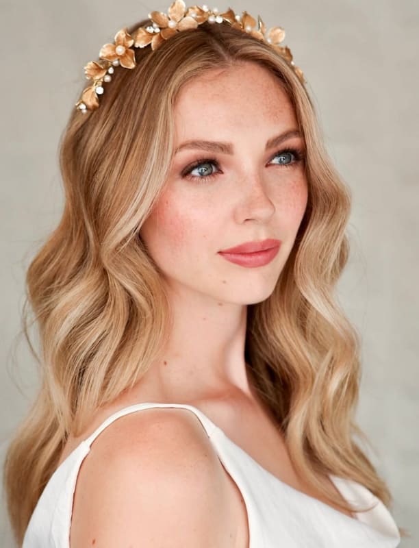 Long blonde ombre wedding hair with flowers
