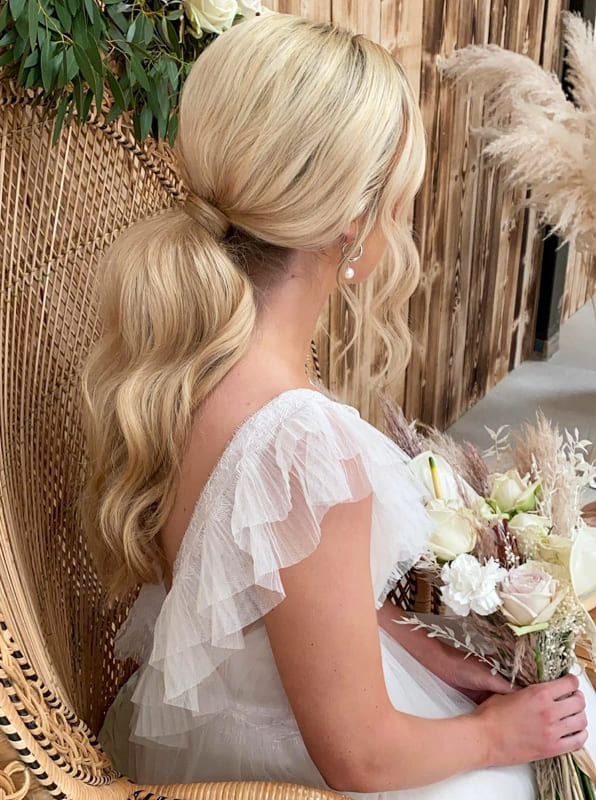 Long ponytail wavy wedding hair