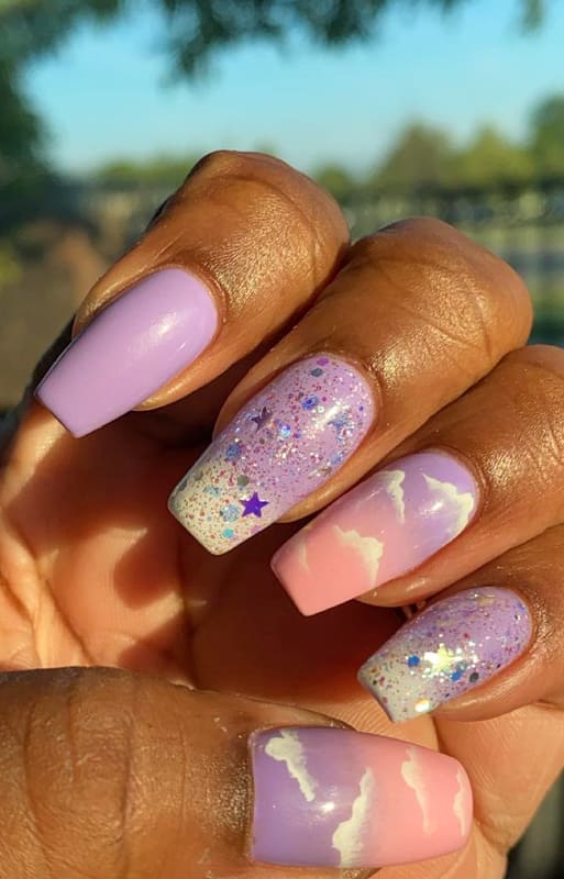 Purple with stars ombre nails