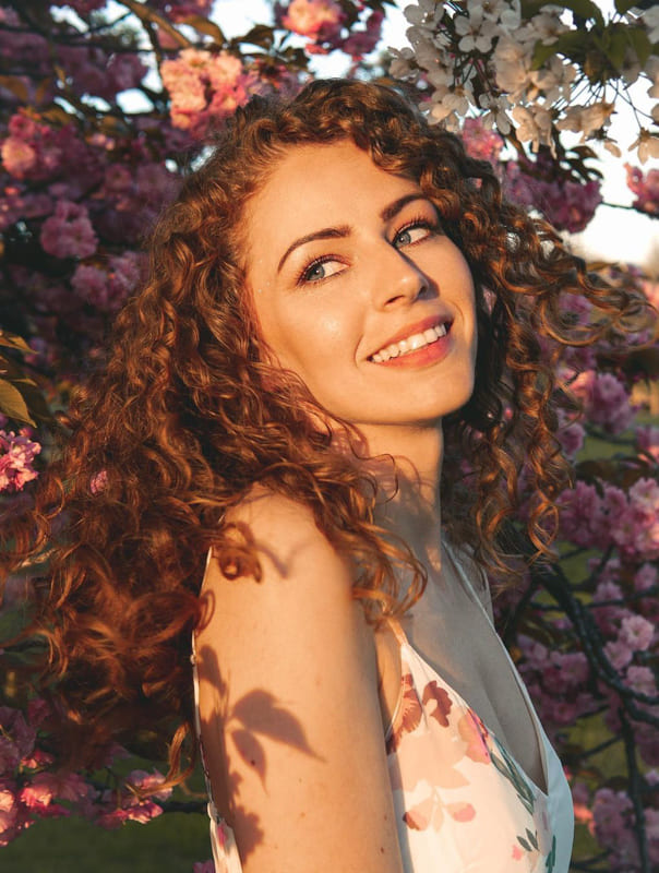 Red long curly hair for bridesmaid