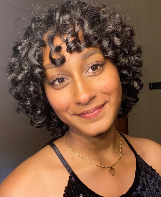 Short curly hairstyles with bangs for women