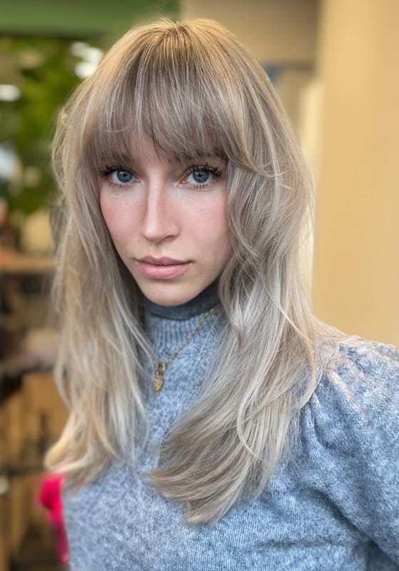 Medium Ash Blonde hair with Bangs