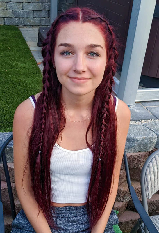 Long braided burgundy hair