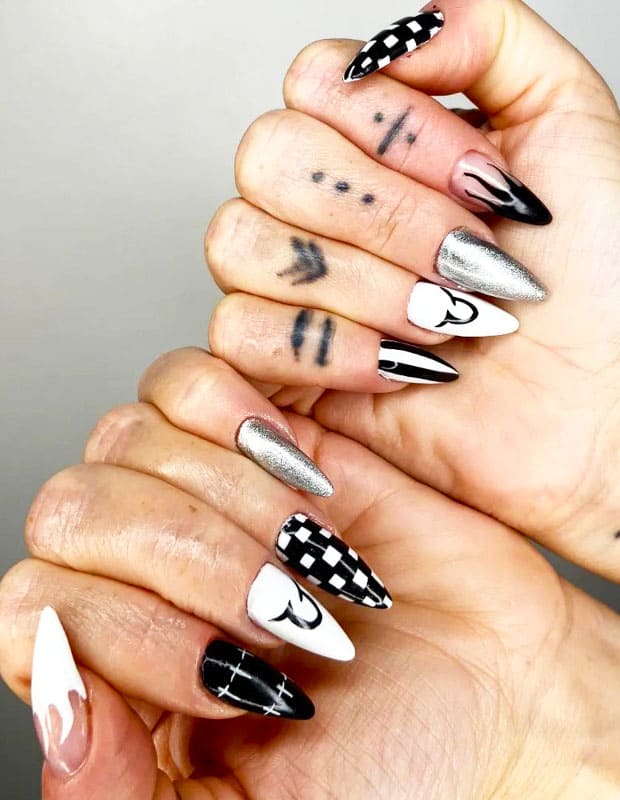 Black nails with Tattoo