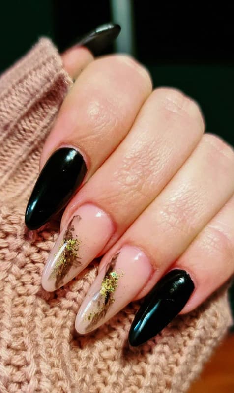 Gold and black almond acrylic nails