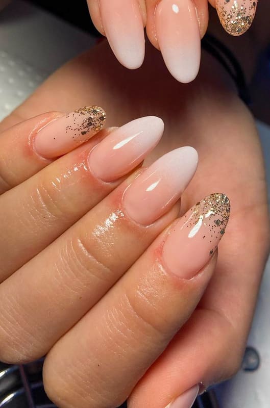 Gold french almond nails