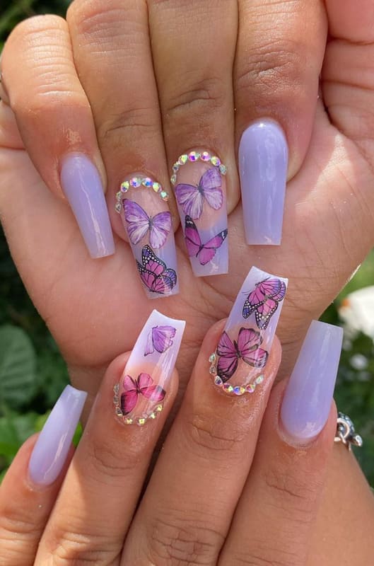 Close up womans hand with matte lavender nail design on gray furry  background. Manicure, pedicure beauty salon concept Stock Photo - Alamy