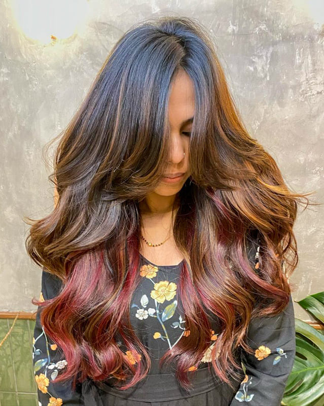 Long layered red hair with caramel