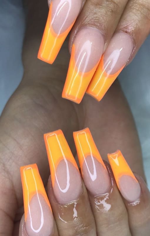 Long orange french coffin nails