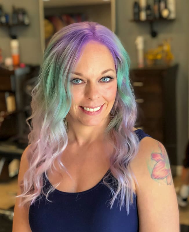 Medium wavy teal and pink hair