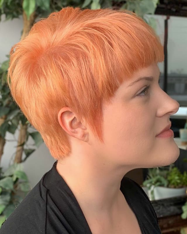 Short Pixie pastel orange hair