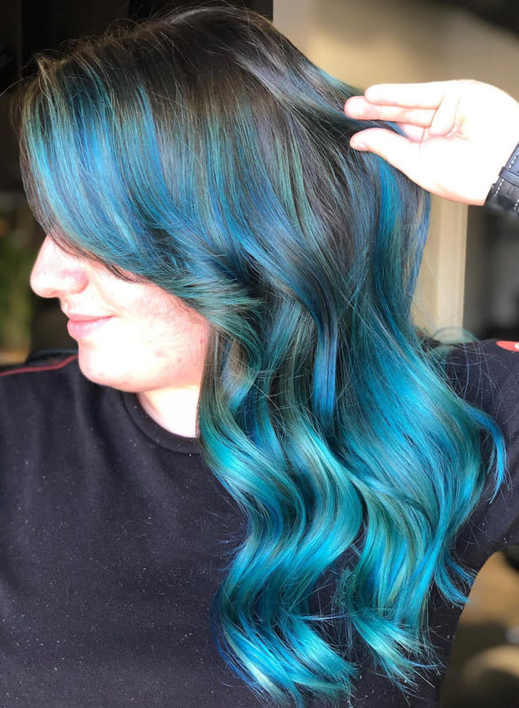 Wavy teal and brown hair