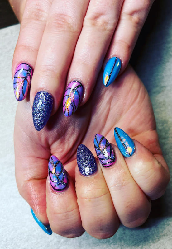 Blue and glitter purple nails