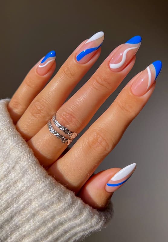 Blue and white swirl nails