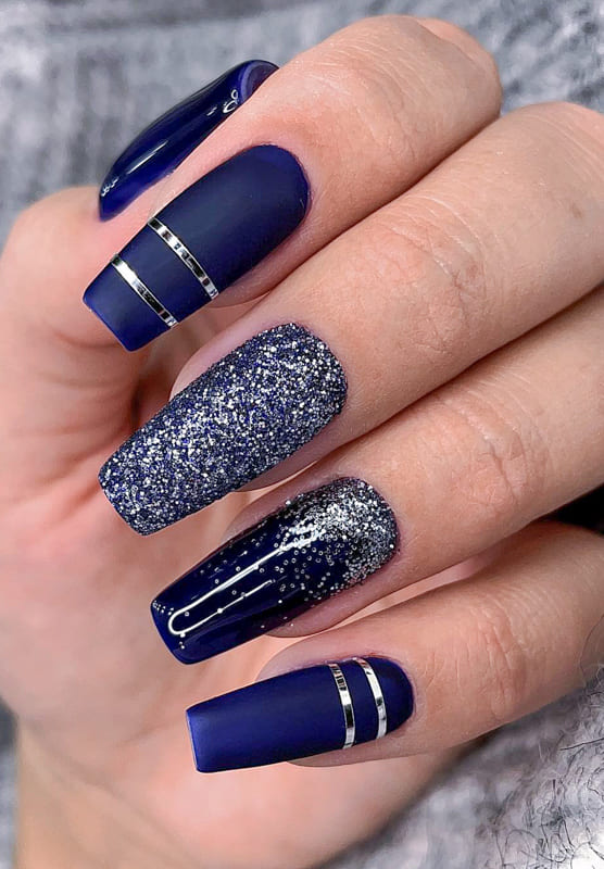 Dark blue and glitter nails