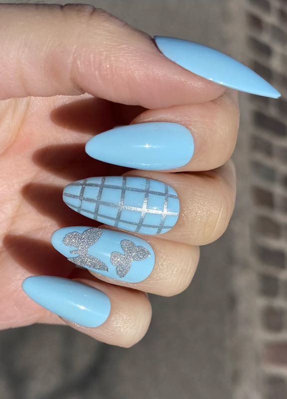 Light blue butterfly nails