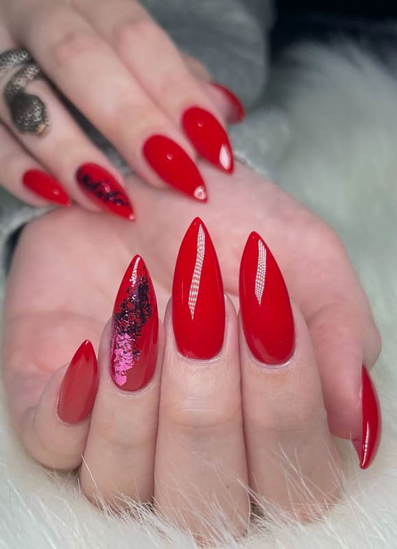 Long stiletto red nails