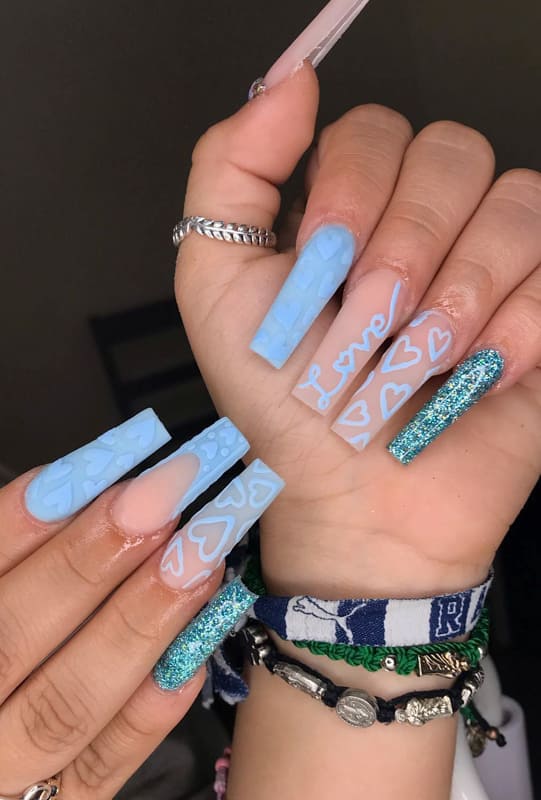 Matte blue nails with hearts