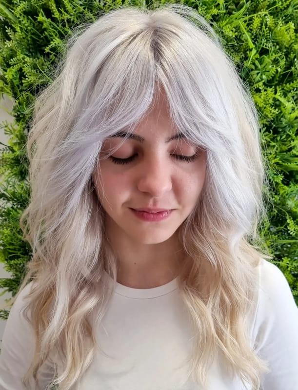 Platinum blonde wolf cut hair