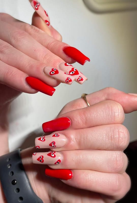 Red acrylic nails with hearts