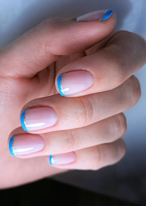 Short blue french acrylic nails