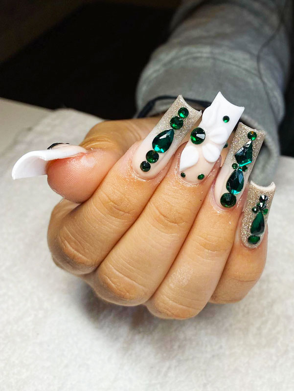 Emerald green with white flower nails
